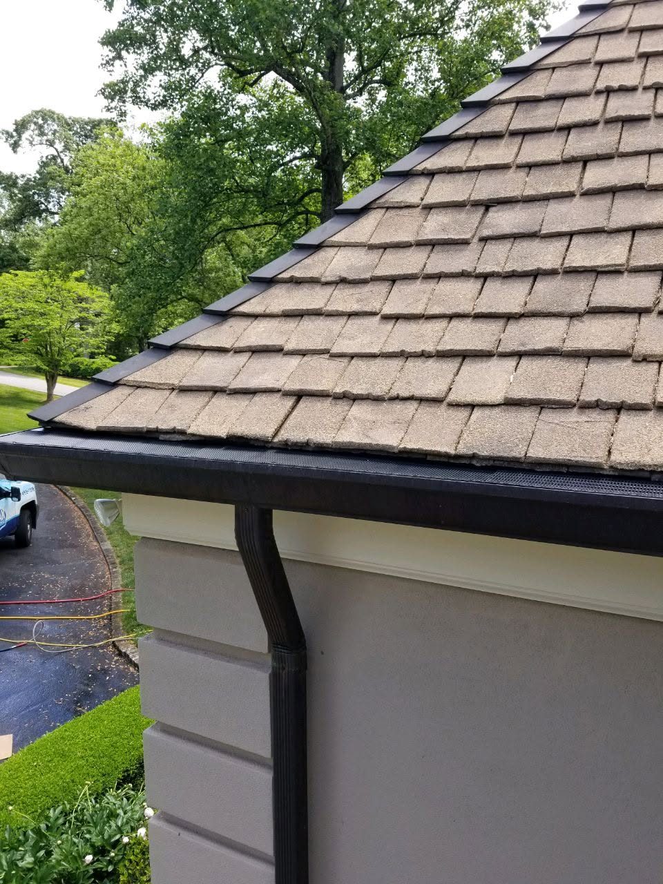 Seamless gutter downspout installation — Hickory Gutter Pros